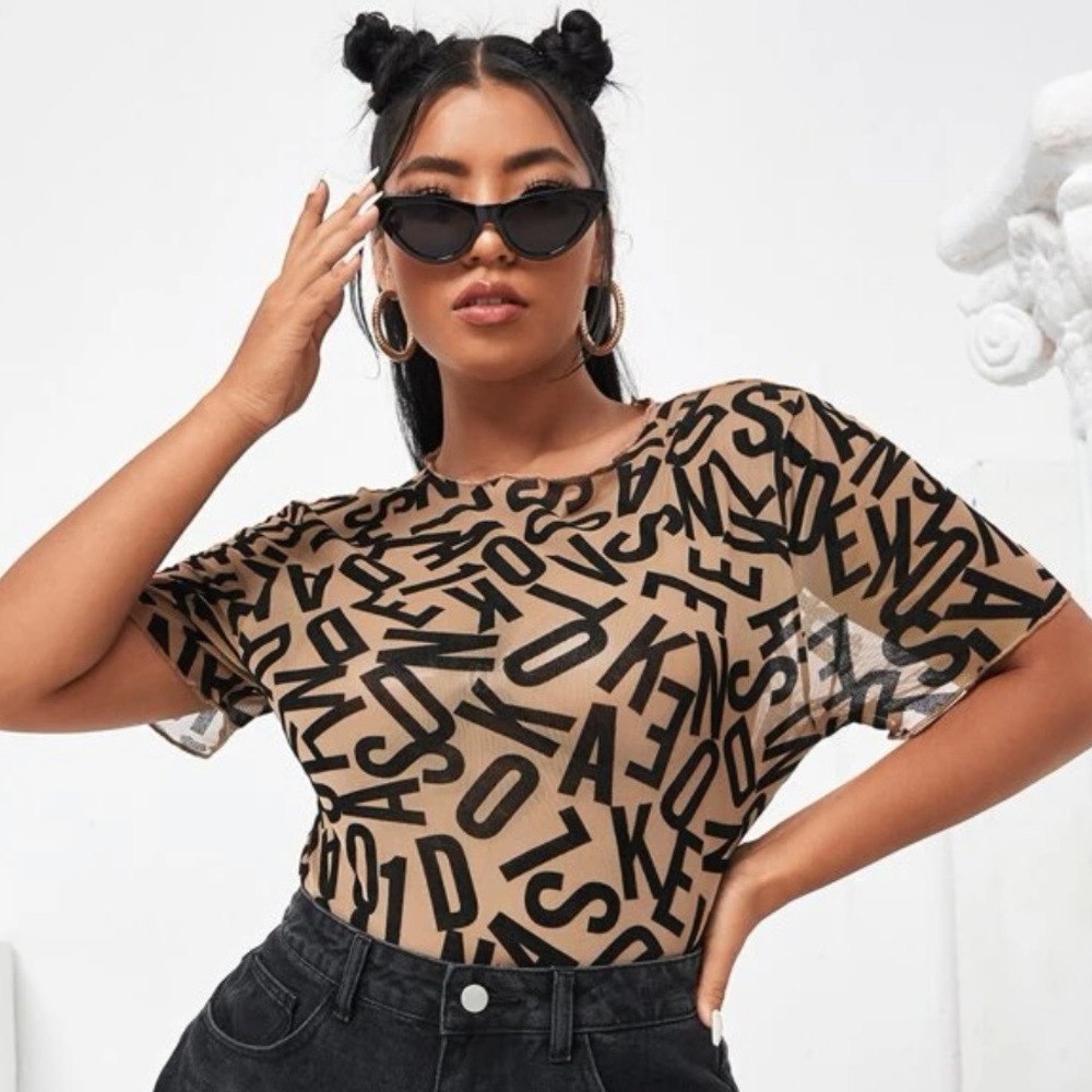 All over letter graphic sheer top
